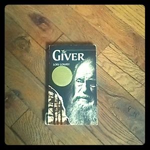 The book "The Giver" by Lois Lowery